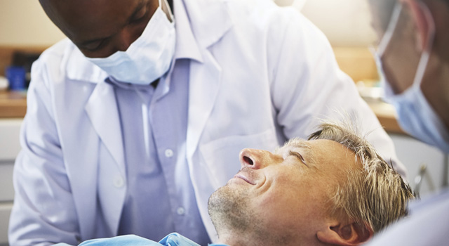 dentist working with patient